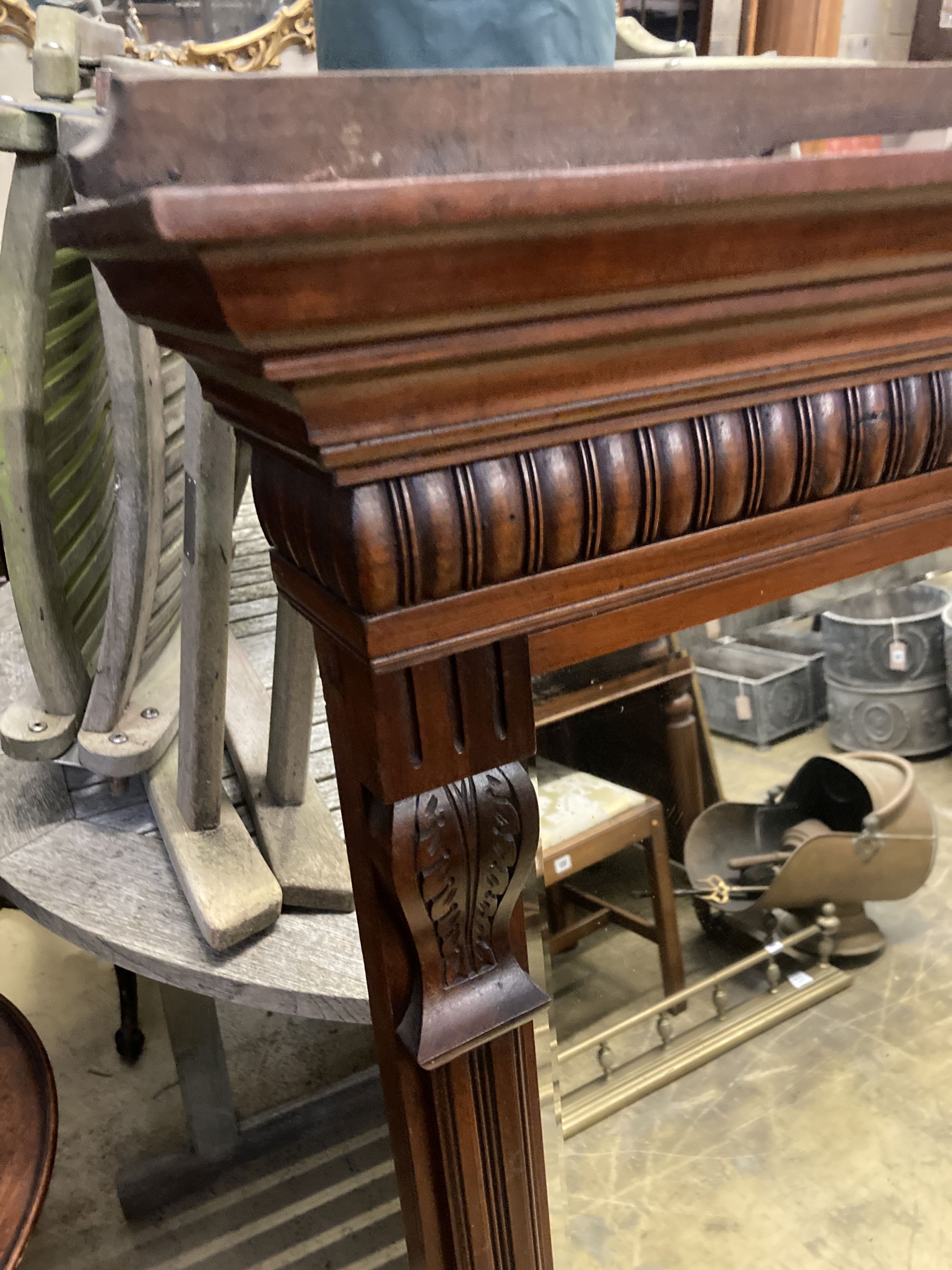 A late Victorian mahogany overmantel mirror, width 115cm, height 147cm